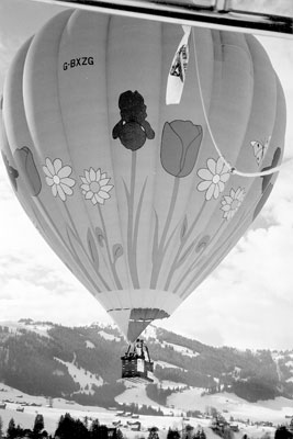 Up goes our balloon. Five or six people are in the basket.