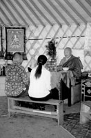 Couple seeking advice from a monk.