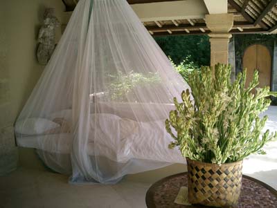 Amankila Resort bed, set up outside.