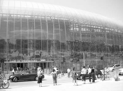 To accommodate new TGV Est train traffic, the façade of the Strasbourg train station has been covered with a glass-and-steel arch that resembles a shimmering bubble.