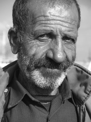 En route to Isfahan, we met this man selling pistachio nuts from a little cart.