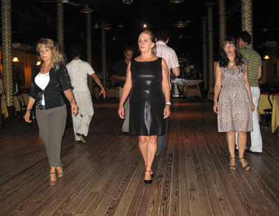 Students line up in a marching formation for their tango lesson.