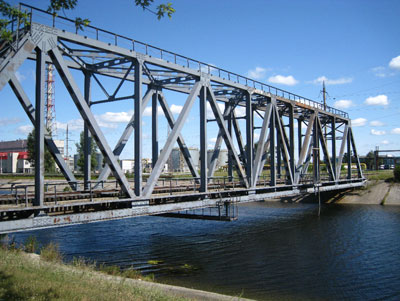 The rusting rail bridge leading to the Chernobyl nuclear power plant — Ukraine. Photo: Earl