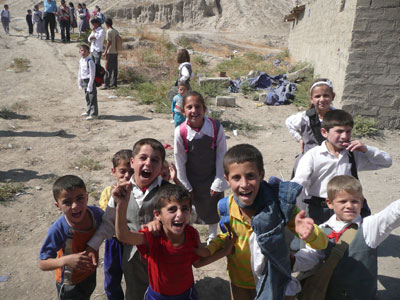 Being greeted by the children at Gaugamela.