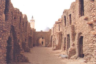 Ghofars within the ksar at Ksar Hadada. (Notice the minaret and mosque in the background.) Photos: Skurdenis