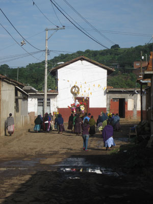 On Sunday, images of the Virgin Mary and Our Lady of Guadalupe are carried through the barrio of the people who were in charge of preparing the flowers and all the food that week.