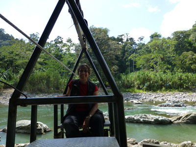 Nili Olay crossing the Pacuare River in a “basket.” Photo by Jerald Vetowich