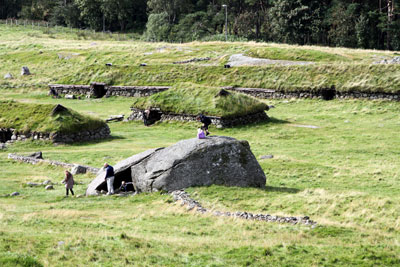 The Iron Age Farm at Ullandhaug, Norway, consists of two longhouses, smaller buildings, wells, stone fences and burial mounds from AD 350 to 550. 