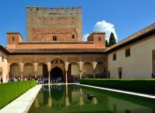 Book reserved-time tickets online as far ahead as possible for Granada’s Alhambra to ensure that you’ll see its best part: the exquisite Palacios Nazaríes. Photo by Cameron Hewitt