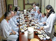 Our Walk Japan group having dinner at an inn. 