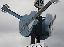 The Crossroads sign in Clarksdale, Mississippi. Photo by Kevin Wierzbicki