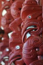 Carvings on the Whare Runanga, a Maori meeting house built in 1940 at the Waitangi Treaty Grounds in New Zealand. Photo: ©Rafael Ben-Ari/123rf.com