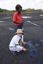 Iris, with our guide, on Pitch Lake, Trinidad.