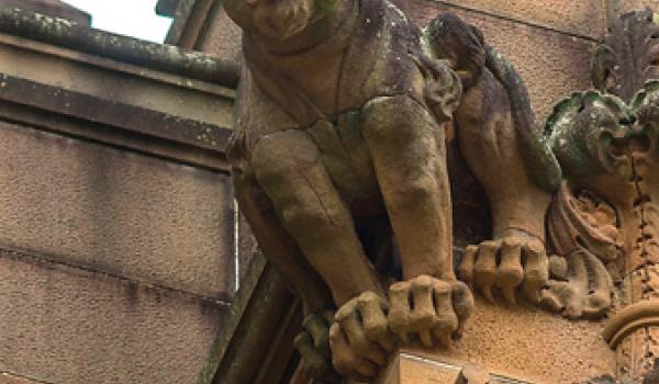 Stone gargoyle on the façade of the Nicholson Museum in Sydney, Australia, founded in 1860. The museum holds 30,000 archaeological artifacts from Egypt, Greece, Italy, Cyprus and the Mideast.