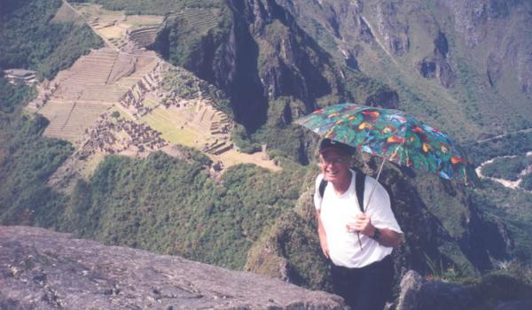 David Irving positioned on Huayna Picchu, overlooking Machu Picchu, in Peru — not so precarious a perch.