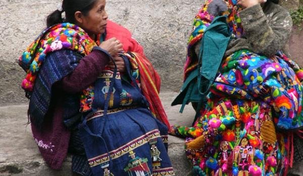 Colorfully dressed vendors in Chichicastenango.