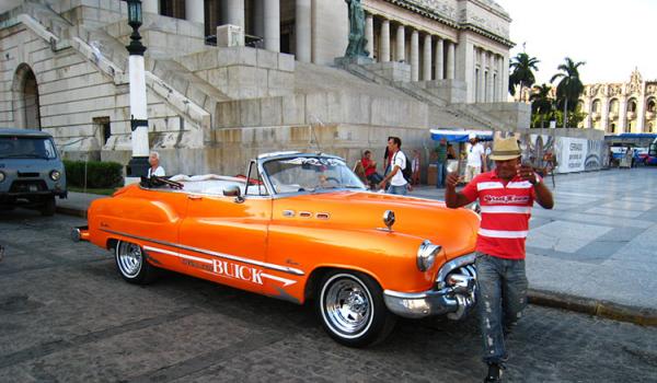 Stilt dancers in the streets of Havana.