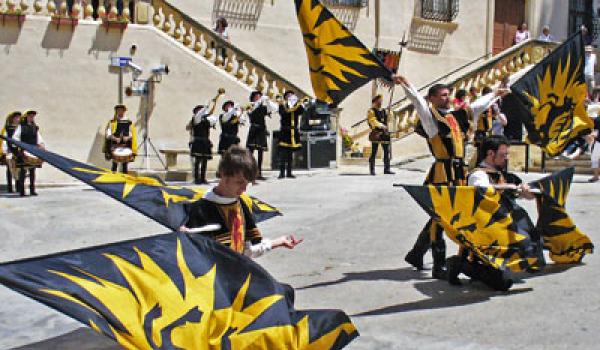 A performance of flag bearers; Gozo, Malta