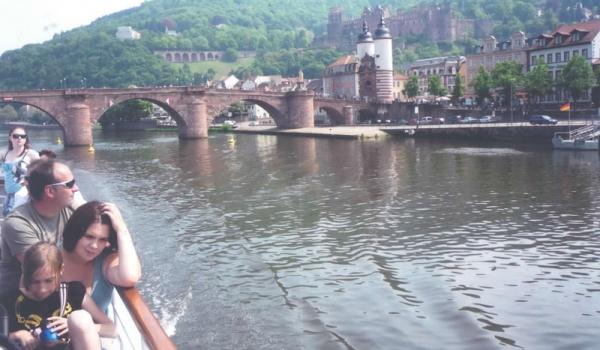 From the river, a view of the Old Bridge and castle in Heidelberg.