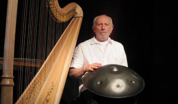 Harpist Luc Vanlaere, with a hang in his lap, in Bruges, Belgium. 