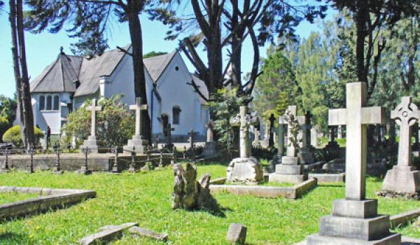 The very Anglican-looking Holy Trinity Church and its graveyard, located in Nuwa