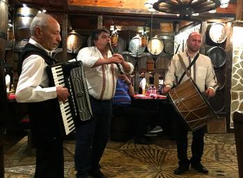 Musicians playing folk music at Hadjidraganov’s Houses in Sofia.