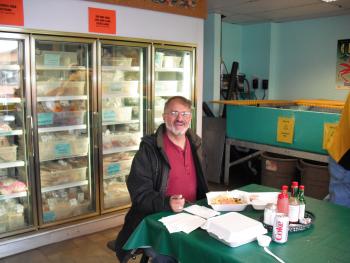 Marv enjoying halibut tacos in Petersburg, Alaska. Photo by Carole Feldman