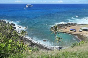 The <i>Aranui 5</i> anchored off Bounty Bay, Pitcairn Island. Photo by Jim Hamel