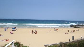 Beachgoers in Newcastle, Australia, on Boxing Day 2019. Photo by Margaret Hinkle