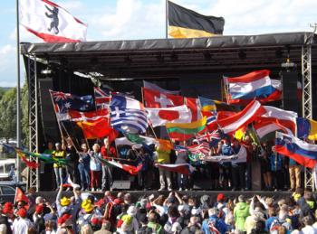 Flags flying on the stage during the opening ceremony of the 15th IVV Olympiad, in Koblenz, Germany. Photos by Rod Smith