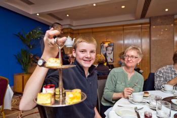 Teens can appreciate Europe’s finer things, such as afternoon tea at London’s Mayfair Hotel. Photo by Dominic Arizona Bonuccelli