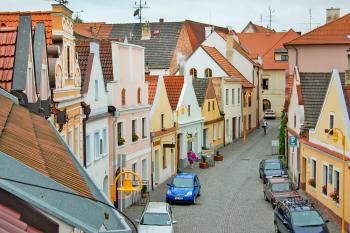 Yellow lampposts brighten a street in Trebon. Photo by Rick Steves