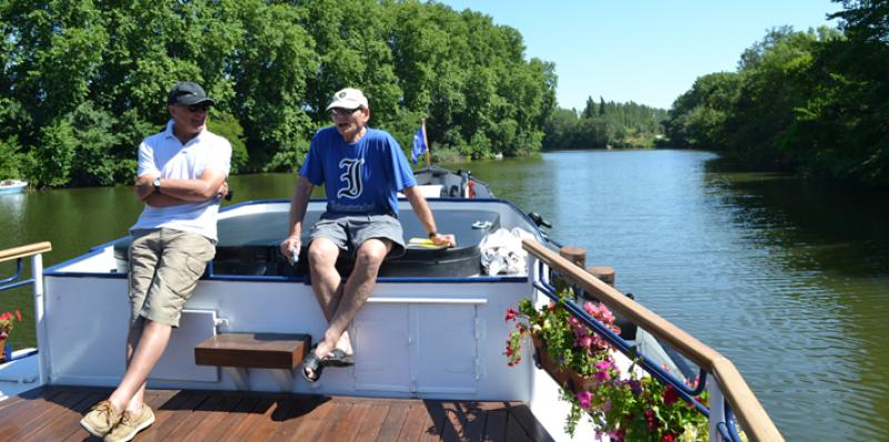 Randy Keck (at right) enjoying the good life with a fellow passenger from Australia, barging on the Canal du Midi in southwest France in spring 2015.